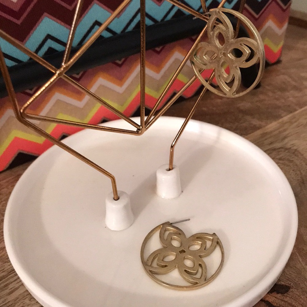 GUC. Brushed gold tone earrings.